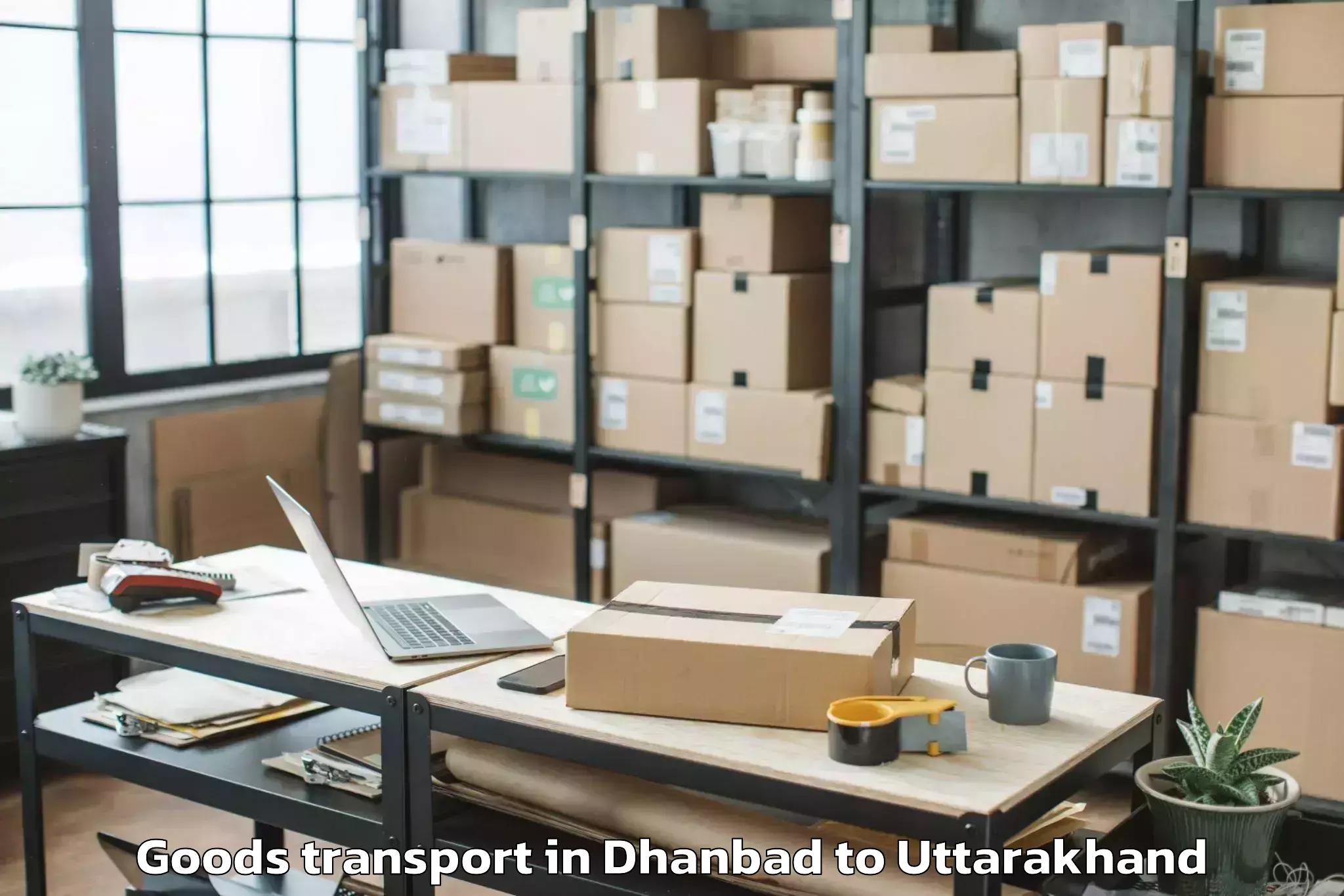 Dhanbad to Rajgarhi Goods Transport Booking